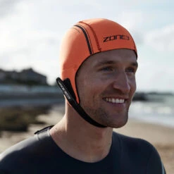 ZONE3 Neoprene Swim Cap -TYR Sales Store orange neoprene cap 6 1000x 2x 79414bd2 9df6 4a23 af81 2d70e76ef774